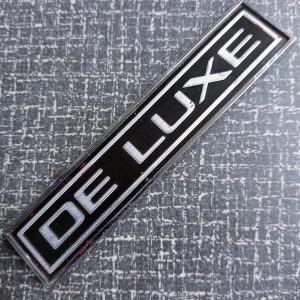 Embleem DE LUXE